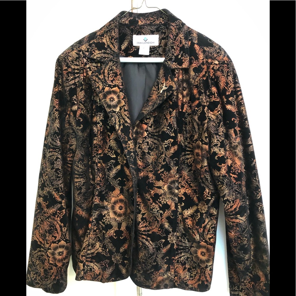 Large jacket multi color oranges and black.